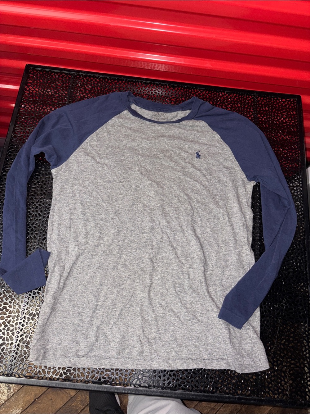 Polo  long sleeve embroidered logo size large 14–16 women’s medium?